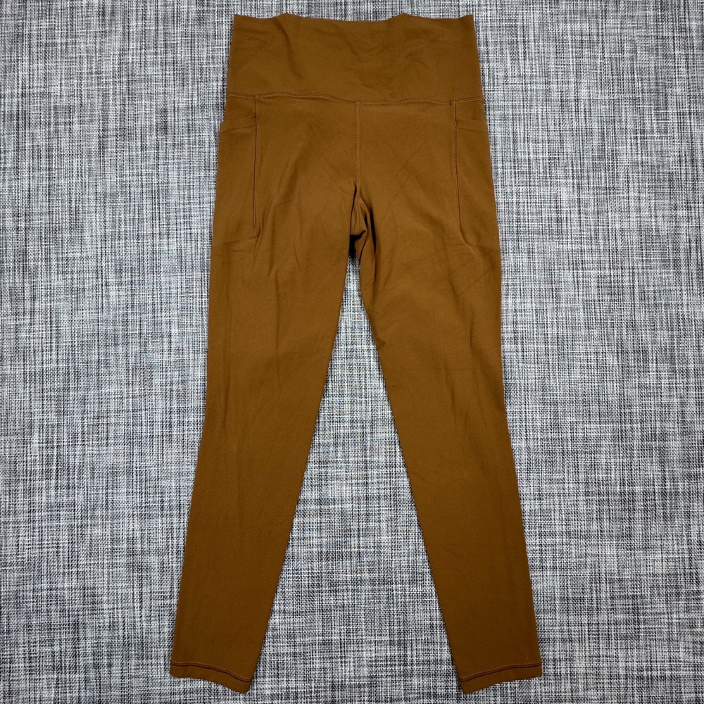 Athleta Womens Small Salutation Stash High Rise Leggings Gold Brown Yoga Pockets